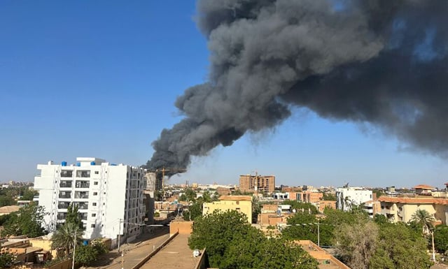 Thousands flee ‘bodies on the streets’ in battle-scarred Khartoum