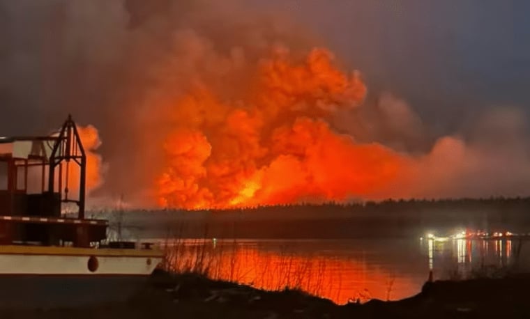 Wildfires in Western Canada force thousands to flee