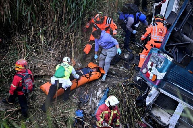 At least 55 dead after Guatemala bus plunges into ravine